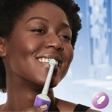 Набір із 2-х електричних зубних щіток Oral-B Vitality Pro D103 Duo Black/Purple 557847 фото